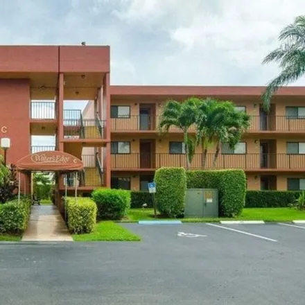 Rent this 2 bed condo on Sims Road in County Club Acres, Palm Beach County