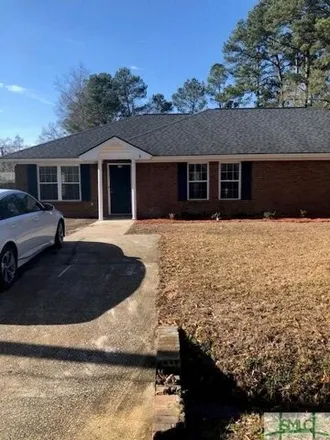 Rent this 3 bed house on 405 1st St in Pooler, Georgia