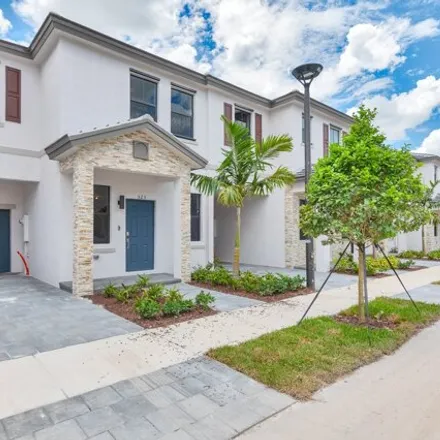 Buy this 3 bed townhouse on 1920 Southwest 5th Street in Fort Lauderdale, FL 33312