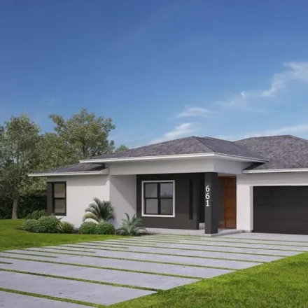 Buy this 4 bed house on 698 J A Bombardier Boulevard Southwest in Palm Bay, FL 32908