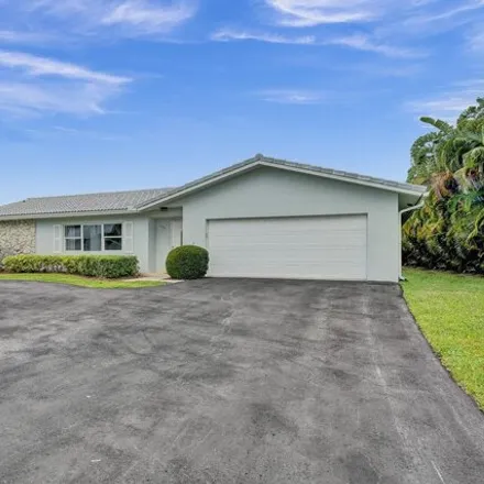 Rent this 4 bed house on 4767 Northwest 5th Avenue in Boca Raton, FL 33431