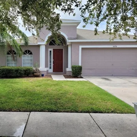 Rent this 4 bed house on 30956 Baclan Drive in Pasco County, FL 33545