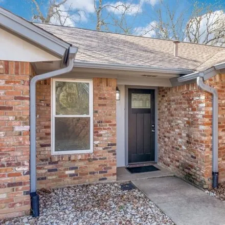 Rent this 3 bed house on 2364 Oakwood Lane in Arlington, TX 76012
