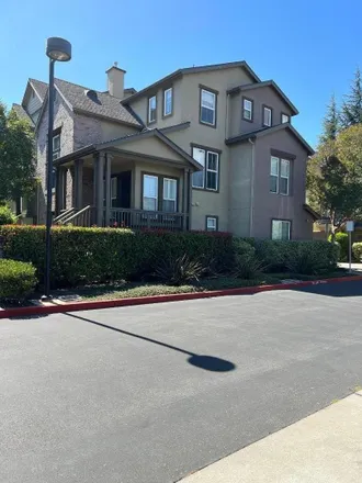 Rent this 4 bed townhouse on 85 Royal Oak Court in Mountain View, CA 94040