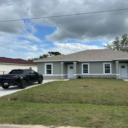 Rent this 3 bed house on 439 Albatross Ct # A in Poinciana, Florida