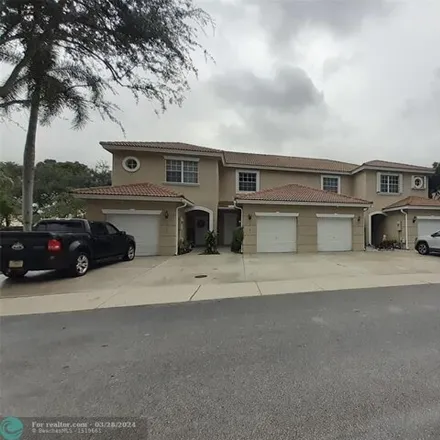Buy this 2 bed townhouse on 12158 Southwest 2nd Street in Pembroke Pines, FL 33025
