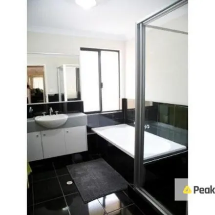 Rent this 4 bed apartment on Gadsden Terrace in Success WA 6164, Australia