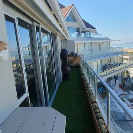Rent this 1 bed apartment on Waves Edge Complex in Bloubergstrand, Western Cape