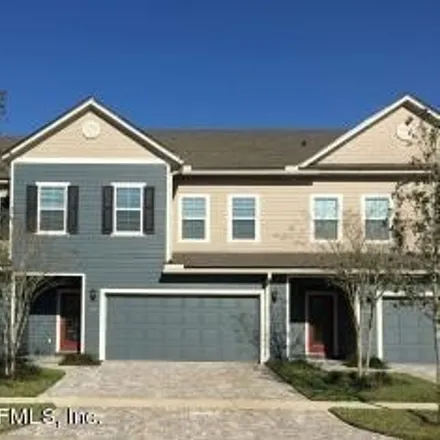 Rent this 3 bed townhouse on 132 Magnolia Creek Walk in Ponte Vedra, Florida