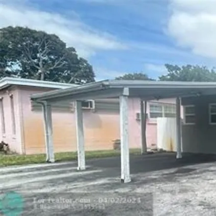 Rent this 3 bed house on 1451 Northeast 202nd Street in Ives Estates, Miami-Dade County