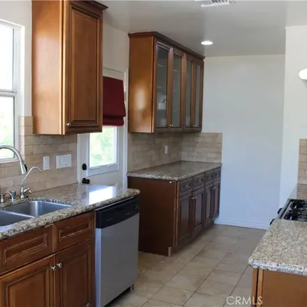 Rent this 4 bed apartment on 9079 Geyser Avenue in Los Angeles, CA 91324