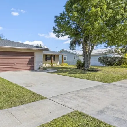 Image 2 - 1036 Woodsmere Parkway, Rockledge, FL 32955, USA - House for sale