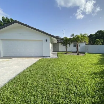 Rent this 3 bed house on 1800 East Court in Lake Clarke Shores, Palm Beach County