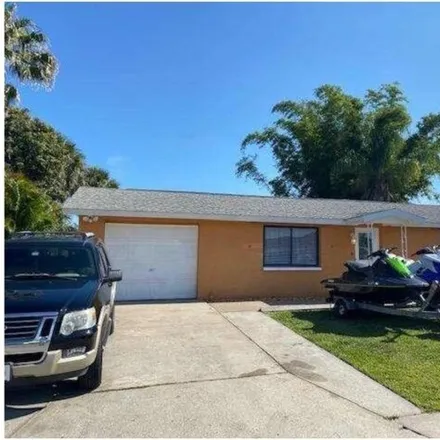 Buy this 3 bed house on 3425 Wilson Drive in Holiday, FL 34691
