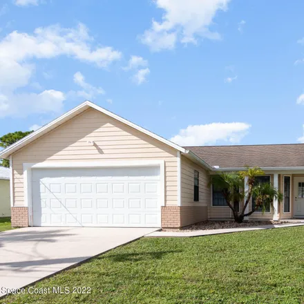 Buy this 3 bed house on 1132 Flower Street Northwest in Palm Bay, FL 32907