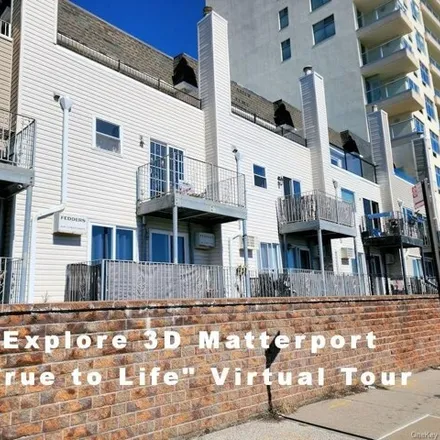 Buy this 6 bed townhouse on 96-14 Shore Front Parkway in New York, NY 11693