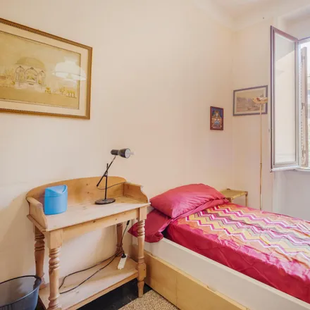 Rent this 4 bed room on Api-Ip in Via Filippo Corridoni, 00195 Rome RM