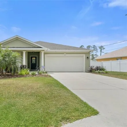 Buy this 3 bed house on 55 Esperanto Drive in Palm Coast, FL 32164