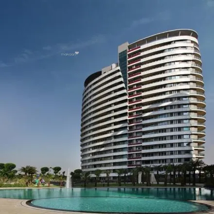 Buy this 3 bed apartment on meghdootam pond with fountains. in Barola Byepass, Noida City Centre