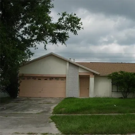 Rent this 4 bed house on 7729 Indian Ridge Trail North in Osceola County, FL 34747