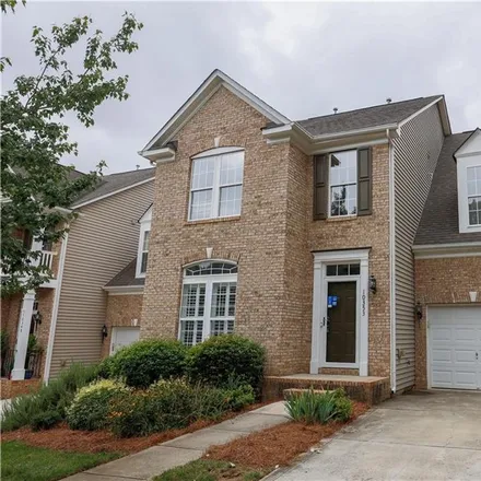 Buy this 4 bed townhouse on 10353 Linksland Drive in Huntersville, NC 28078