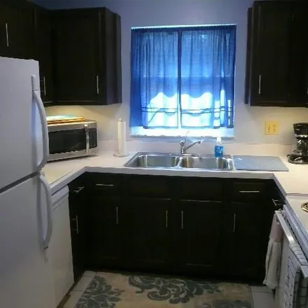 Rent this 2 bed apartment on 146 Spring Lake Drive in Florida Ridge, FL 32962