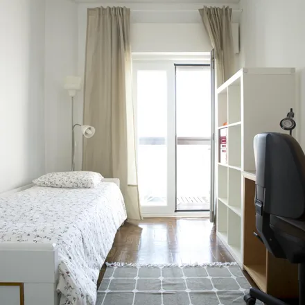 Rent this 4 bed room on Largo João Vaz in 1700-046 Lisbon, Portugal