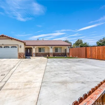 Buy this 4 bed house on 1516 North Ash Avenue in Rialto, CA 92376