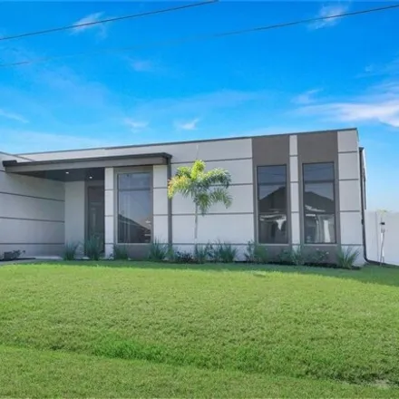 Buy this 4 bed house on 3718 Northwest 3rd Street in Cape Coral, FL 33993