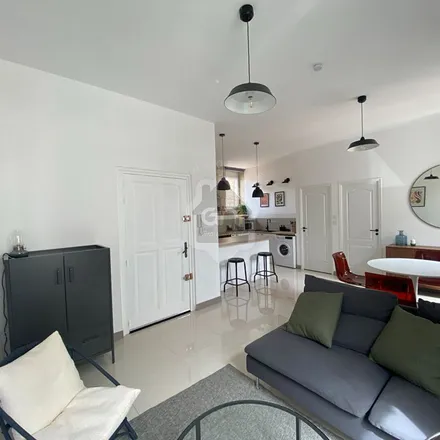 Rent this 2 bed apartment on 1 Place des Arènes in 30000 Nîmes, France