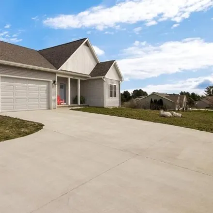 Buy this 5 bed house on 3846 Hill Valley Drive in Garfield Township, MI 49685