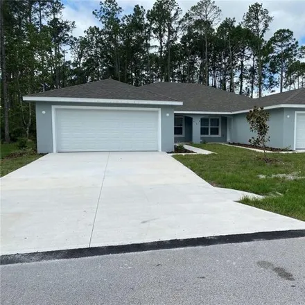 Rent this 4 bed house on 3 Ryapple Lane in Palm Coast, FL 32164