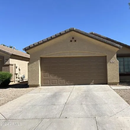 Rent this 4 bed house on 13960 West Country Gables Drive in Surprise, AZ 85379