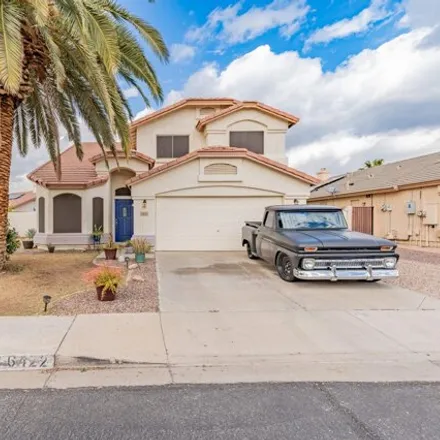 Buy this 4 bed house on 6422 West Adobe Drive in Glendale, AZ 85308