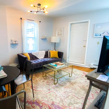 Rent this 2 bed apartment on Good Eats Pizza & Subs in 1002 Tremont Street, Boston