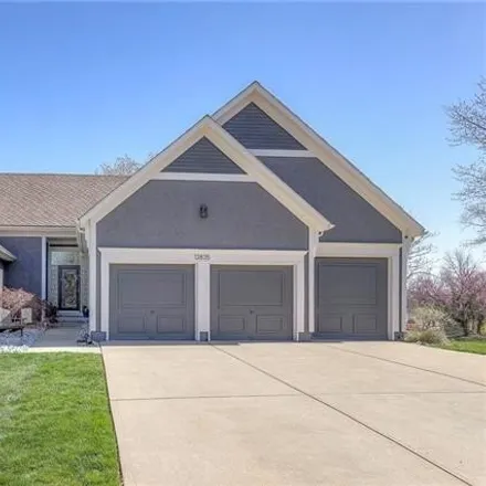 Buy this 4 bed house on 13889 Craig Street in Overland Park, KS 66223