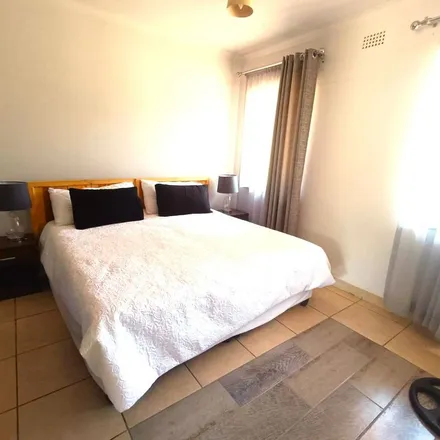 Rent this 2 bed townhouse on Market Street in Fairland, Johannesburg