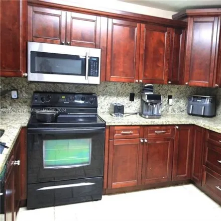 Buy this 2 bed condo on 3144 Riverside Drive in Coral Springs, FL 33065