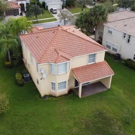 Rent this 4 bed house on 2719 Pienza Circle in Royal Palm Beach, Palm Beach County