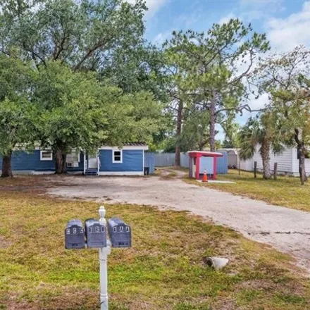 Buy this 4 bed house on 8207 Sevigny Drive in Suncoast Estates, Lee County