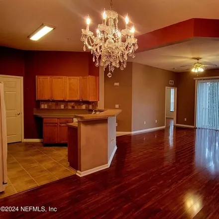 Rent this 3 bed condo on 785 Oakleaf Plantation Pkwy Unit 1931 in Orange Park, Florida