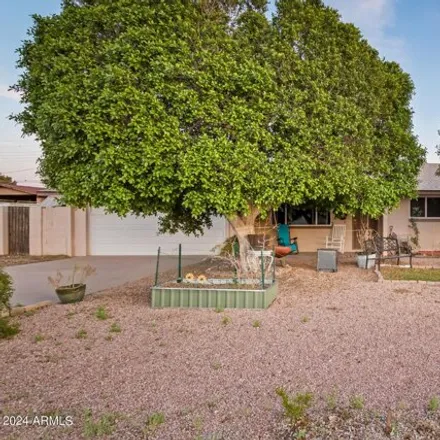 Buy this 3 bed house on 6617 East Holiday Drive in Mesa, AZ 85215