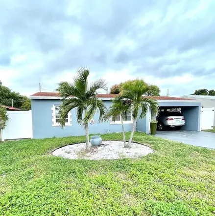 Rent this 2 bed house on 3371 Lake Avenue in West Palm Beach, FL 33405