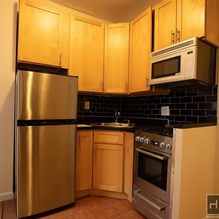 Rent this 2 bed apartment on 215 East 77th Street in New York, NY 10075