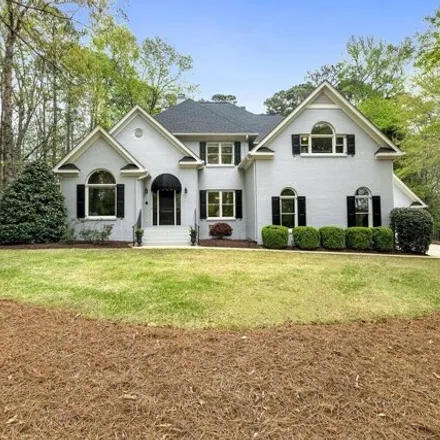 Buy this 5 bed house on 6094 Heatherstone Drive in Wake County, NC 27606
