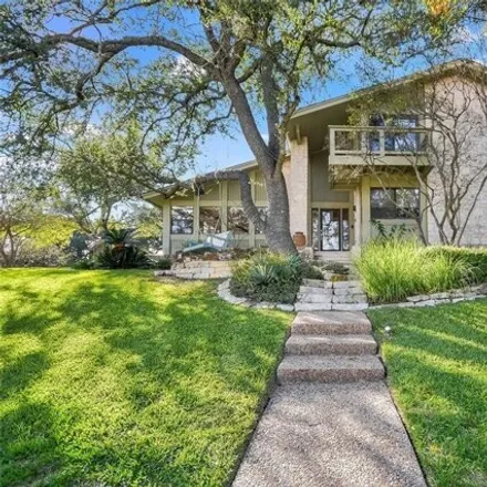 Rent this 4 bed house on 2004 Cypress Point East in Austin, TX 78735