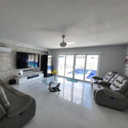 Buy this 3 bed house on 7525 Roosevelt Street in Hollywood, FL 33024