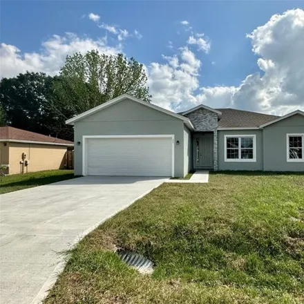 Rent this 4 bed house on 752 Dromedary Drive in Polk County, FL 34759