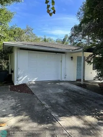 Buy this 2 bed house on 5486 Winter Garden Parkway in Lakewood Park, FL 34951