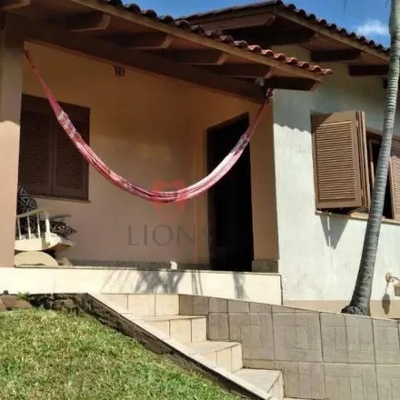 Rent this 3 bed house on Rua Cássio Soares in Dom Feliciano, Gravataí - RS